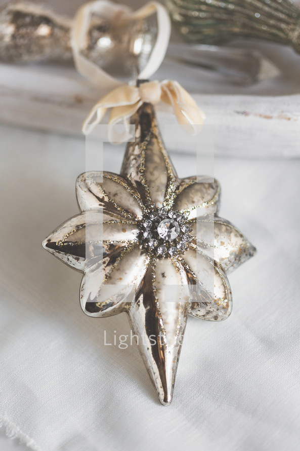 Close Up of Shiny Christmas Ornament on White Background