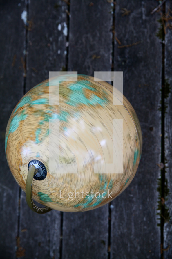 globe on old boards 