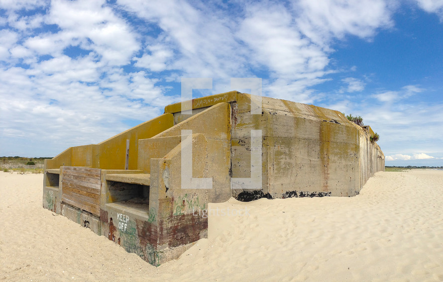 Cement bunker in the sand.