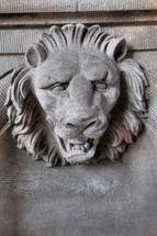stone lion head carving 