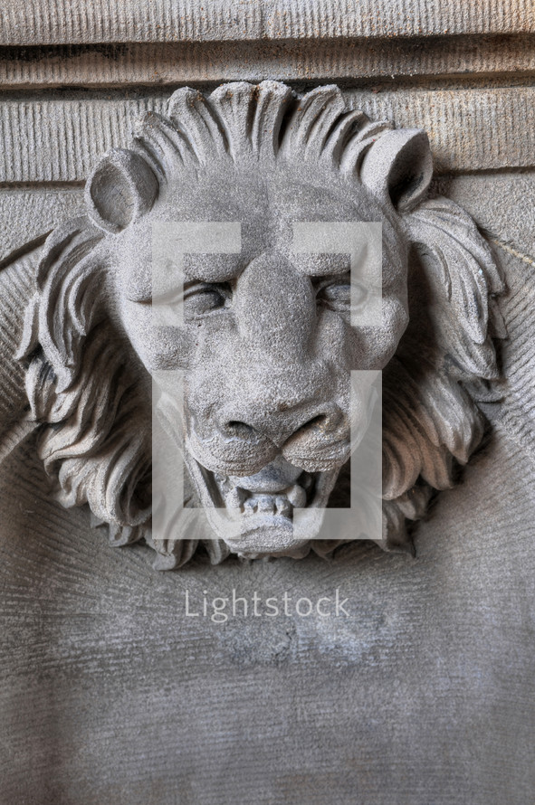 stone lion head carving 