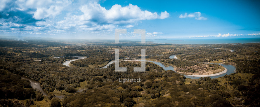 aerial view over landscape and river 