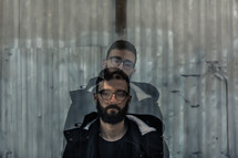 double exposure image of a man with a beard and coat 