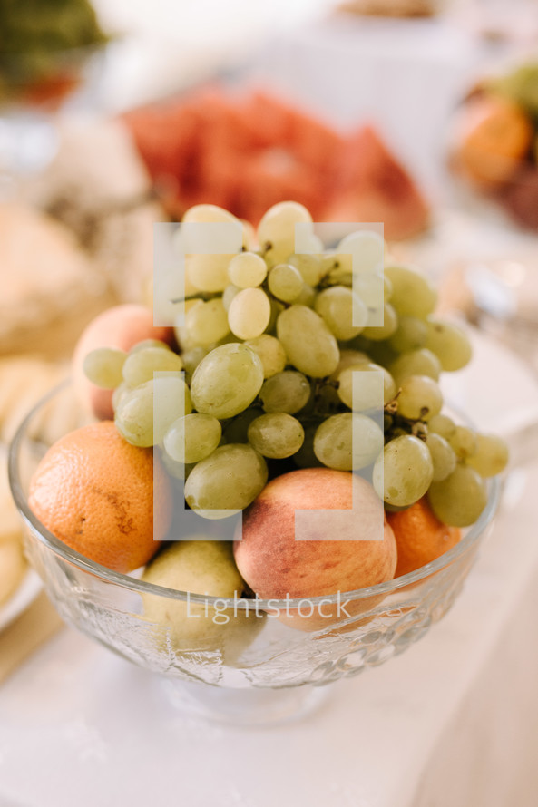 grapes and fruit in a bowl 
