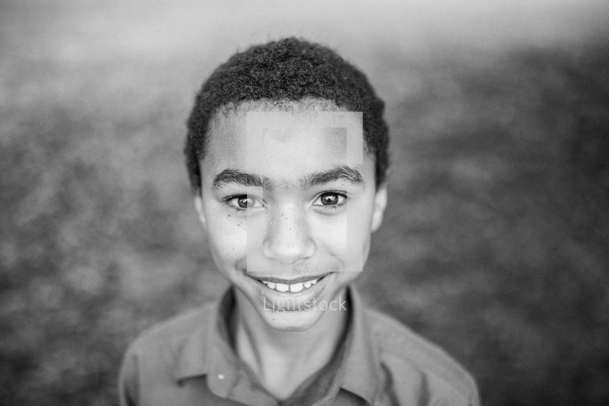 headshot of a smiling boy 