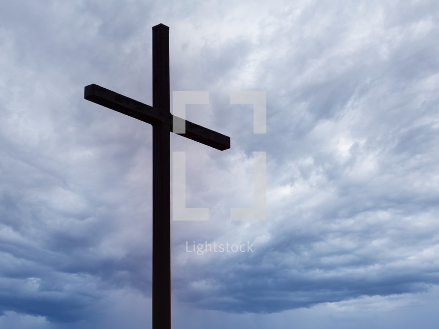 Cross against the clouds