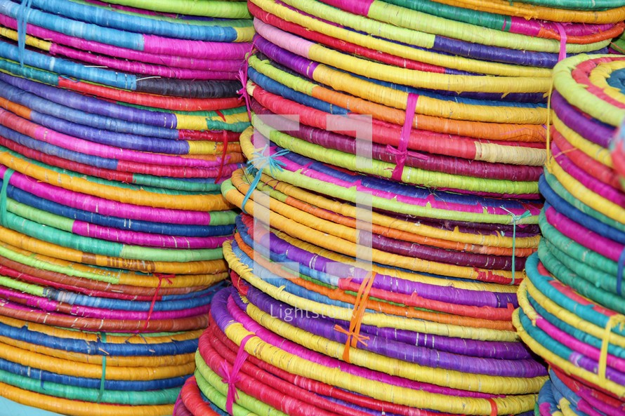 colorful string and twine basket background 