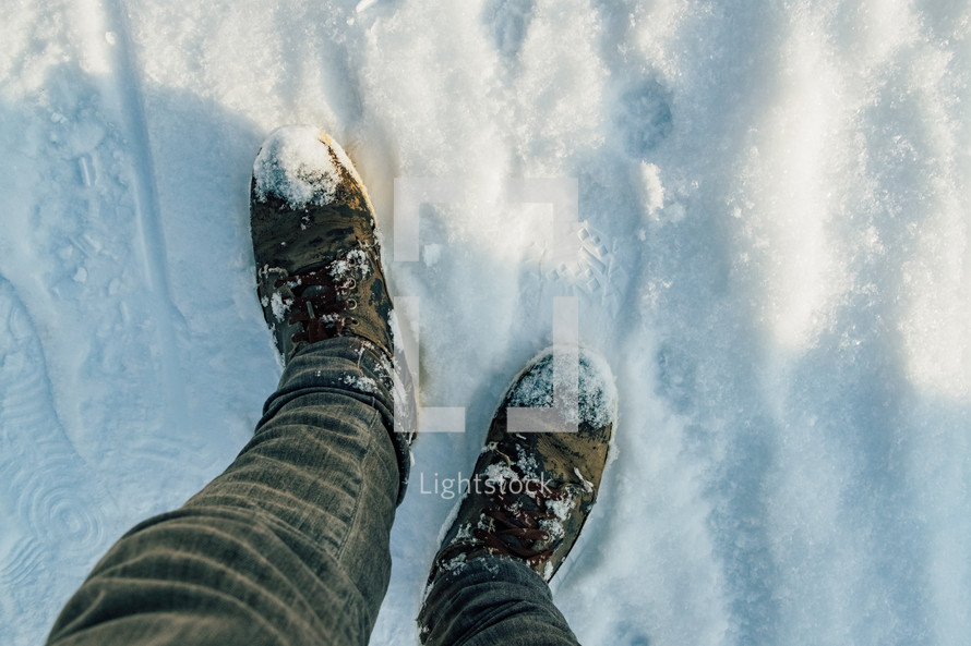 shoes standing in snow 