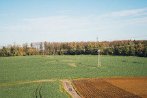 Rural farm fields with electrical wires