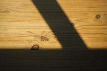 shadows on a wood floor 