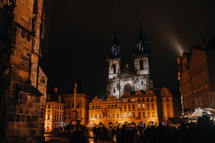 Old town square with Church of Lady before Tyn at night. Famous historical, gothic style buildings. Cityscape in european capital.