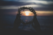 setting sun and crown of thorns 
