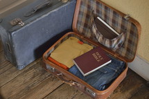 Bible packed in a suitcase 