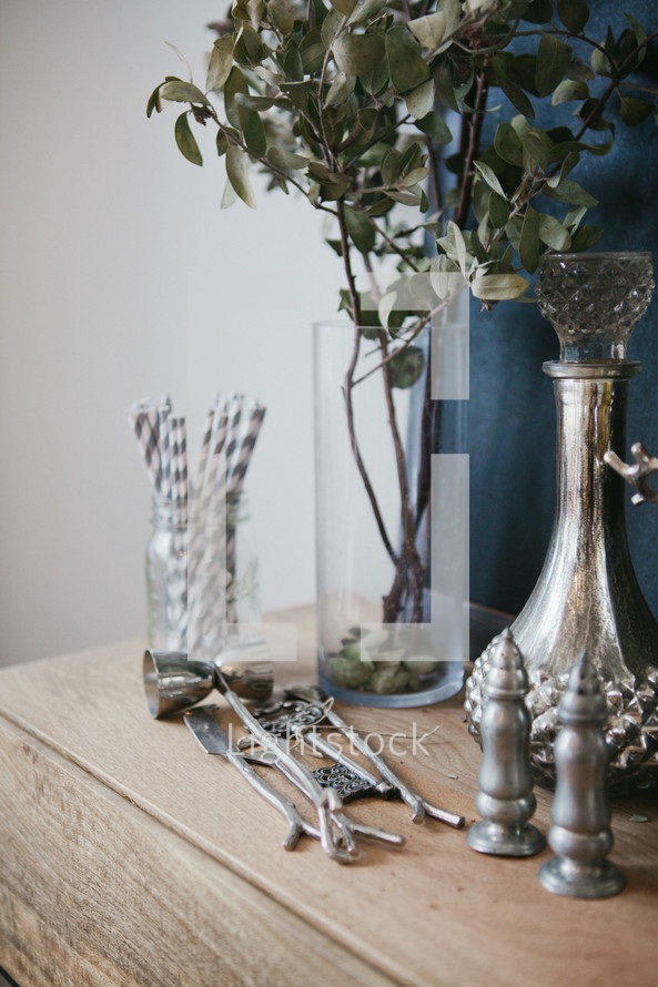 silver trinkets on a table 