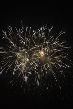 vibrant bursting fireworks in the night sky 