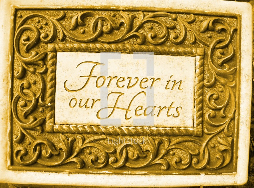 Forever in our Hearts sign found on a gravestone in Central Florida. 