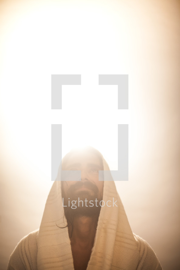 glowing Jesus looking up 