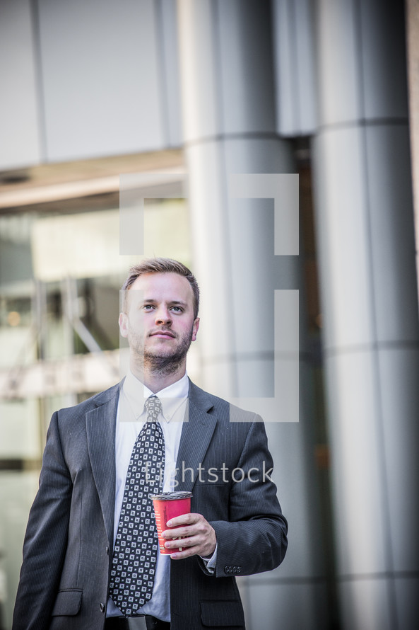 portrait of a businessman with coffee cup 