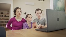Mother talking to her kids online on the computer during the COVID-19 lockdown