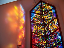 The Healing Window -  chapel with a large stained glass window that reflects the glowing light of Heaven on its walls