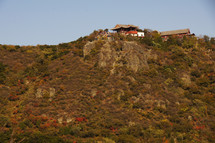 house at the top of a mountainside