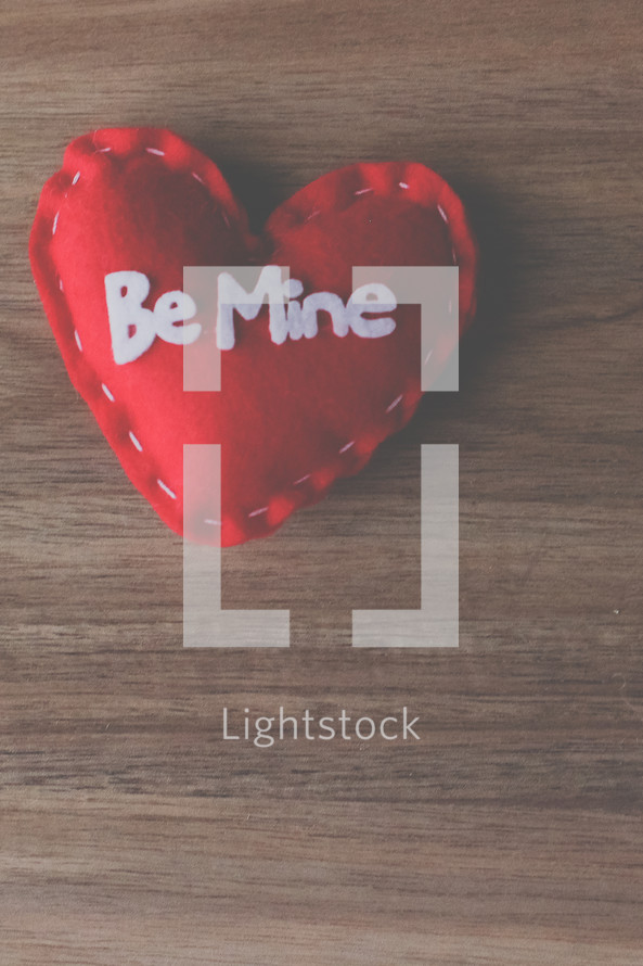 red felt heart with Be mine 
