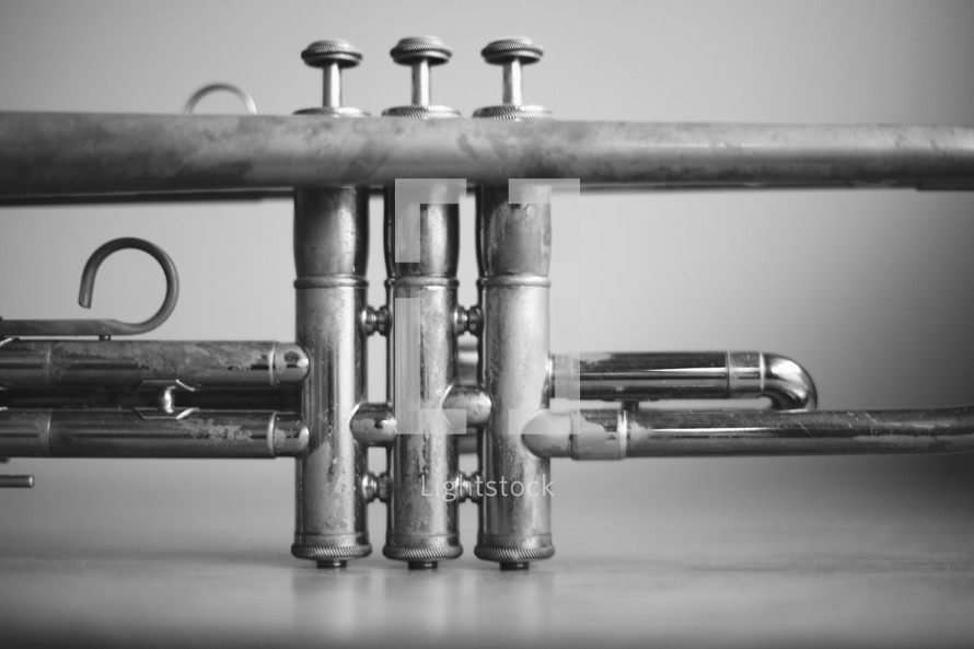 a close up of trumpet valves