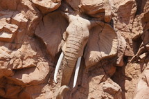 carving of an elephant  in the rock
