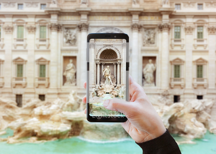 Using the camera with a mobile phone. Trevi Fountain, Rome, Italy