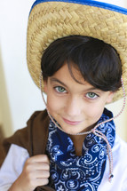 Boy wearing a bandana and hat