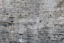 Eroded grey stone background 