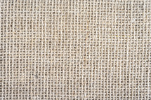 Abstract background, close up photo from a piece of Burlap fabric.