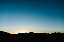 silhouette of desert mountains 
