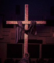 An Easter Cross with Purple shroud and crown of thorns 