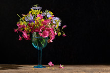 Summer field Bouquet flowers in vintage glass shoot in studio