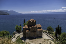 old stone church overlooking the sea 
