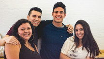 group of smiling young adults 