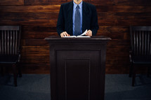 speaker at a podium 