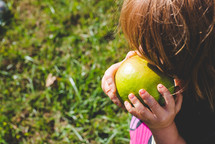 girl eating an apple 