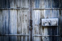 metal mailbox on a door 