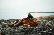 campfire on a beach 