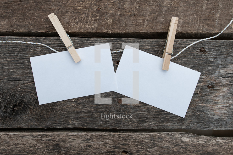 blank card stock on clothespins 