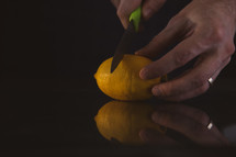 cutting a lemon 