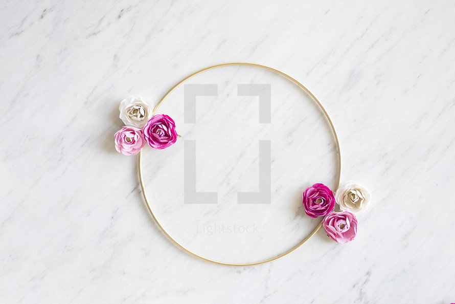 white and pink roses on a wreath 