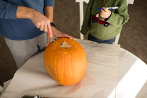 carving a pumpkin 