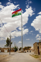 Iraqi flag on a flag pole 