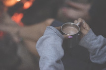woman holding a mug of hot chocolate 