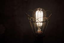 glowing filaments in an Edison bulb 