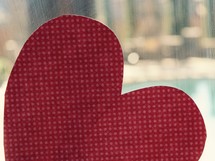 a heart shape in a window 