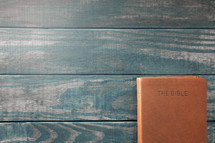 Bible on a wood background  